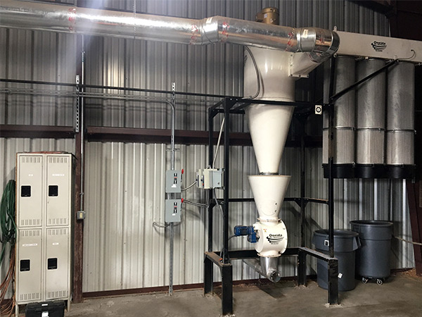 10HP Cyclone Dust Collector installed with an expansion chamber, air lock valve, and blow through adapter