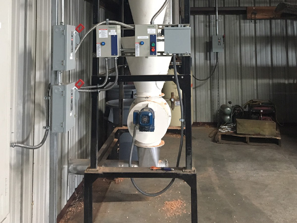 The blow through adapter fitting allows for a high volume of air to move away from the air lock valve.