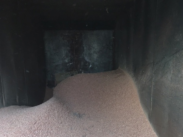 Dust is deposited in a large, ventilated trailer for later disposal